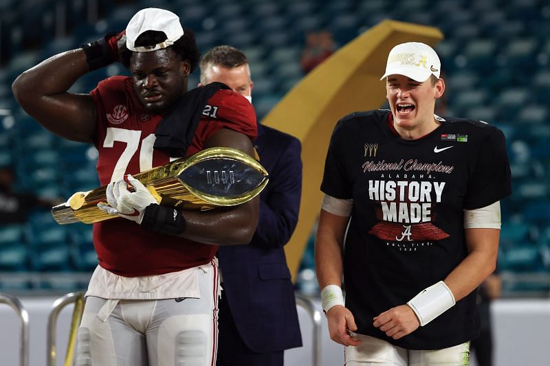 Mac Jones and Alex Leatherwood celebrate the Alabama National Championship