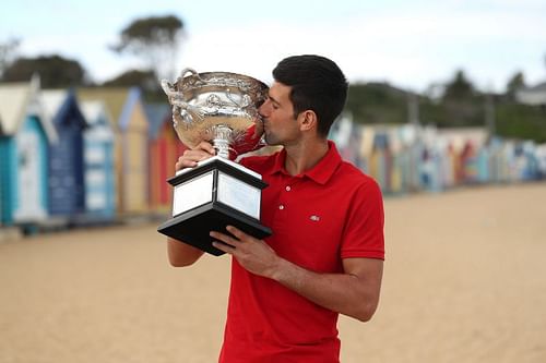 Novak Djokovic with the 2021 Australian Open trophy