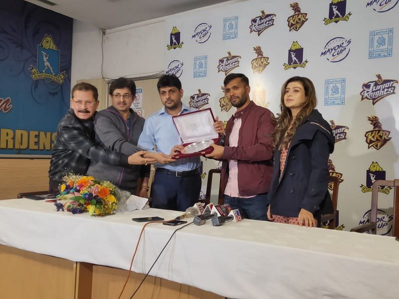 Ashoke Dinda was presented with a silver plaque and bouquet for his contributions to Bengal cricket [Credits: Srinjoy Sanyal]