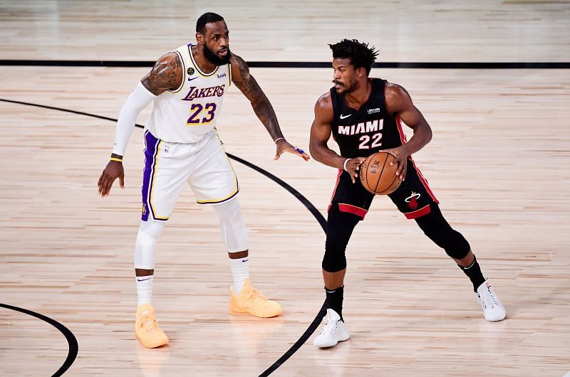 Miami Heat&#039;s Jimmy Butler guarded by LA Lakers&#039; LeBron James in the 2020 NBA Finals - Game Six