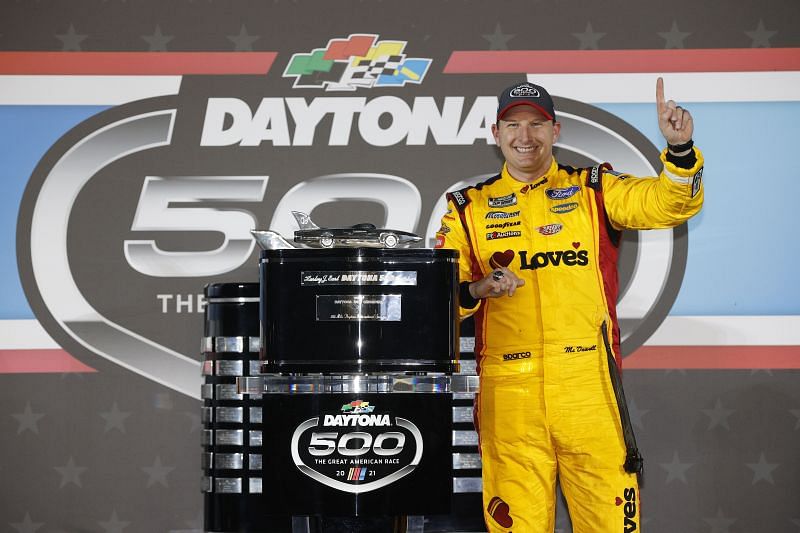 Michael McDowell poses with the Harley J. Earl Trophy after winning the Daytona 500. (Photo by Chris Graythen/Getty Images)