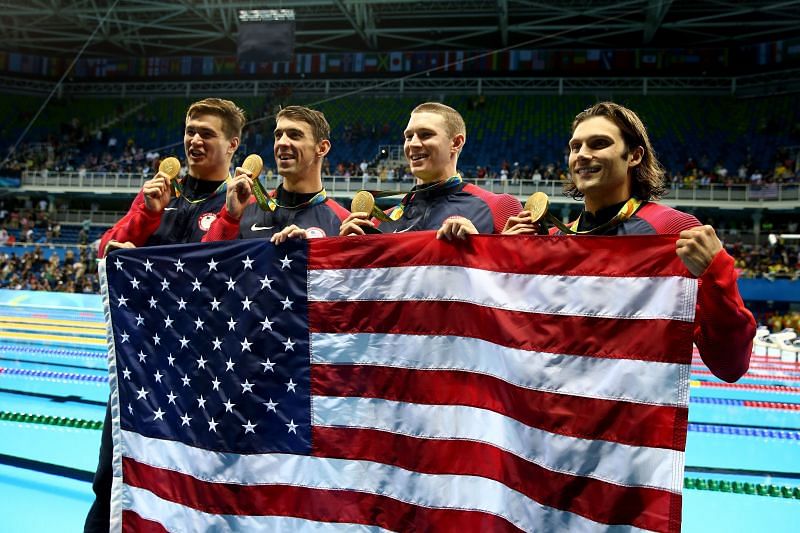 (L-R) Gold medalists Nathan Adrian, Michael Phelps, Ryan Murphy and Cody Miller of the United States
