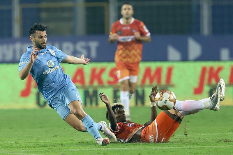 Mumbai City FC&#039;s Hugo Boumous (L) in action against FC Goa&#039;s Saviour Gama (R) in their last ISL match (Image Courtesy: ISL Media)