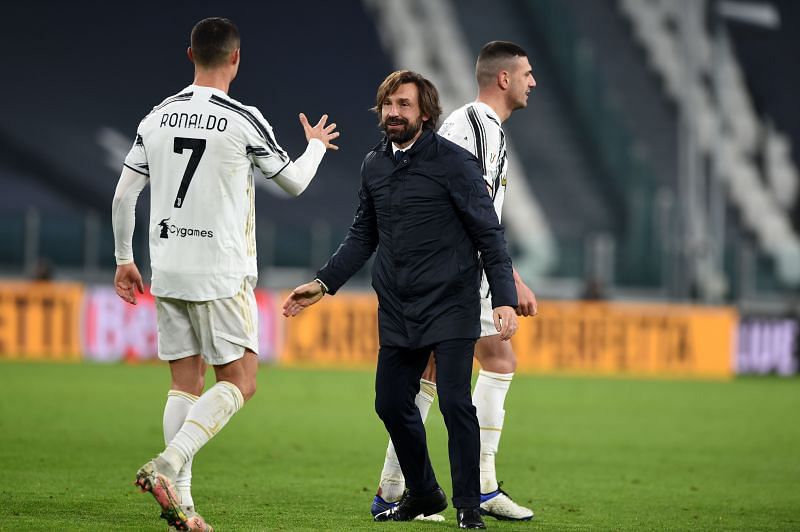 Juventus boss Andrea Pirlo celebrates with Cristiano Ronaldo after eliminating Inter Milan