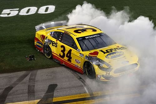 Michael McDowell celebrates his Daytona 500 win for team owner Bob Jenkins and Front Row Motorsports. Photo: Getty Images