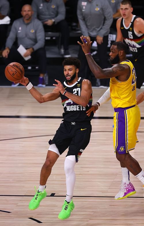 Jamal Murray of the Denver Nuggets goes up against LeBron James of the LA Lakers