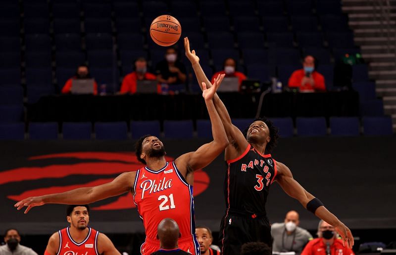 Joel Embiid of the Philadelphia 76ers and OG Anunobyxof the Toronto Raptors