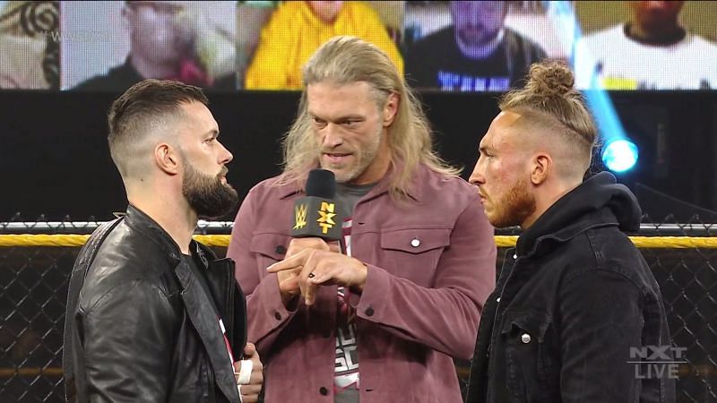 Edge (C) confronting Finn Balor (L) and Pete Dunne (R) on WWE NXT