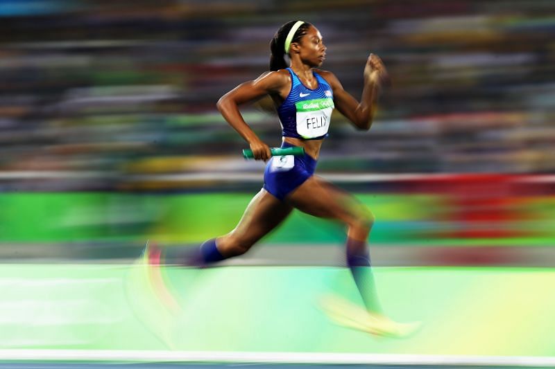 Allyson Felix competing in the 4*400m relay in the 2016 Rio Olympics.
