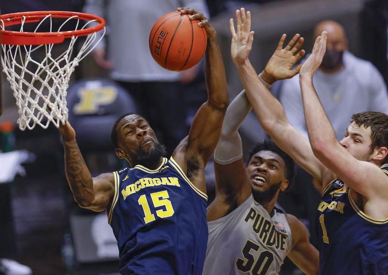 Chaundee Brown #15 of the Michigan Wolverines grabs the rebound