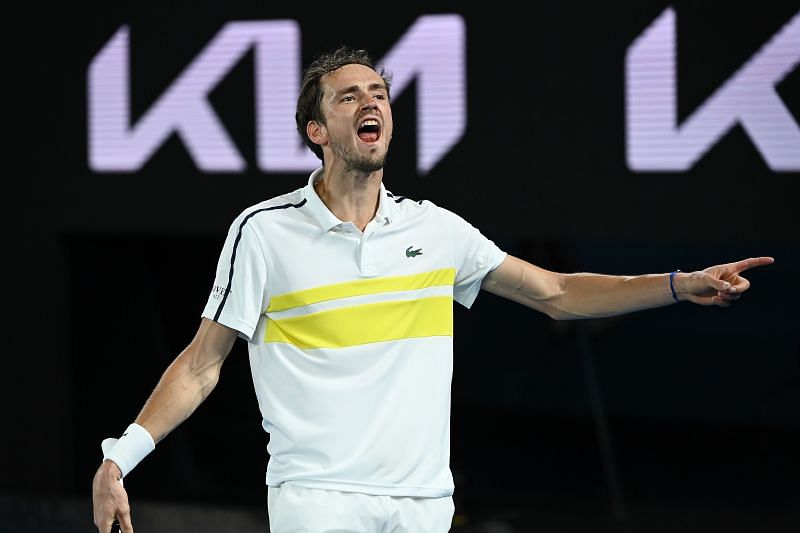 Daniil Medvedev reacts after winning a point against Stefanos Tsitsipas.