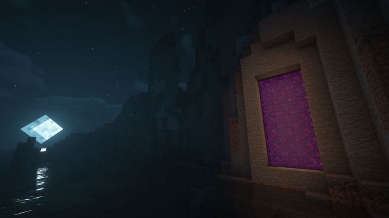 A large Nether Portal embedded in a mountain (Image via Minecraft)