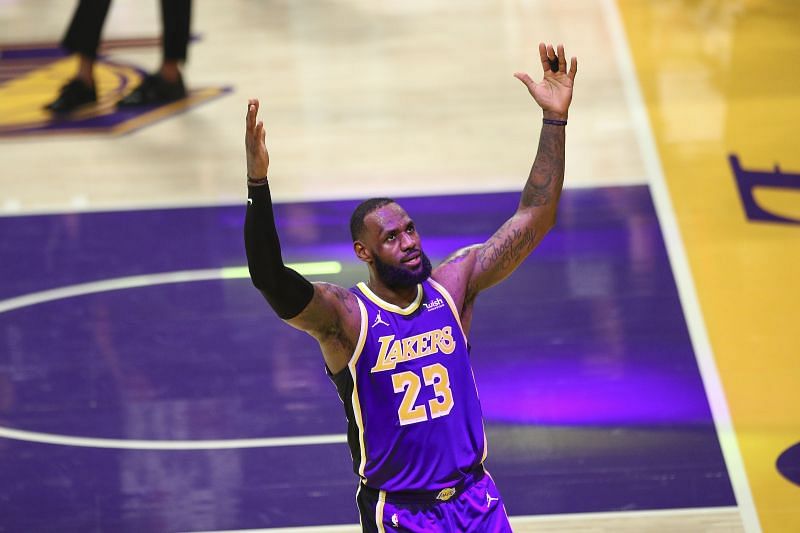 LeBron James #23 of the LA Lakers celebrates his basket at the end of the third quarter against the Memphis Grizzlies at Staples Center on February 12, 2021