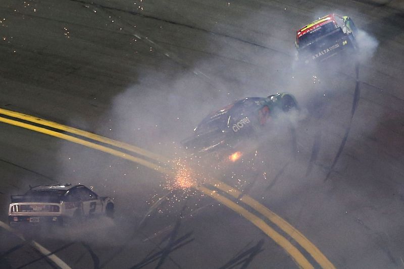 Brad Keselowski, Ross Chastain, and William Byron spin after an on-track incident during the Bluegreen Vacations Duel #2. (Photo by Brian Lawdermilk/Getty Images)