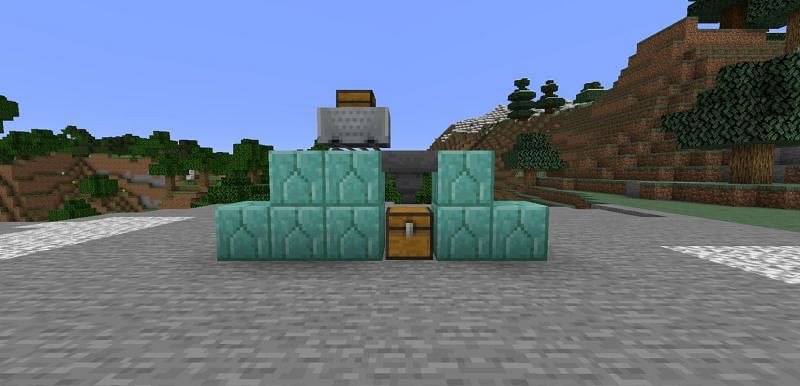 A set-up required for earning the &quot;Freight Station&quot; achievement in Minecraft Bedrock Edition (Image via Minecraft)