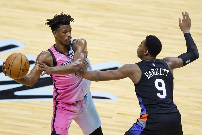 Jimmy Butler #22 of the Miami Heat is defended by RJ Barrett #9 of the New York Knicks during the fourth quarter at American Airlines Arena on February 09, 2021 (Photo by Michael Reaves/Getty Images)