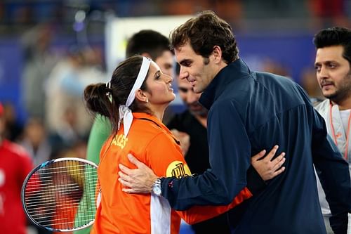 Sania Mirza (L) and Roger Federer