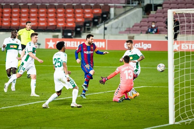 Lionel Messi scored twice as Barcelona beat Elche 3-0.