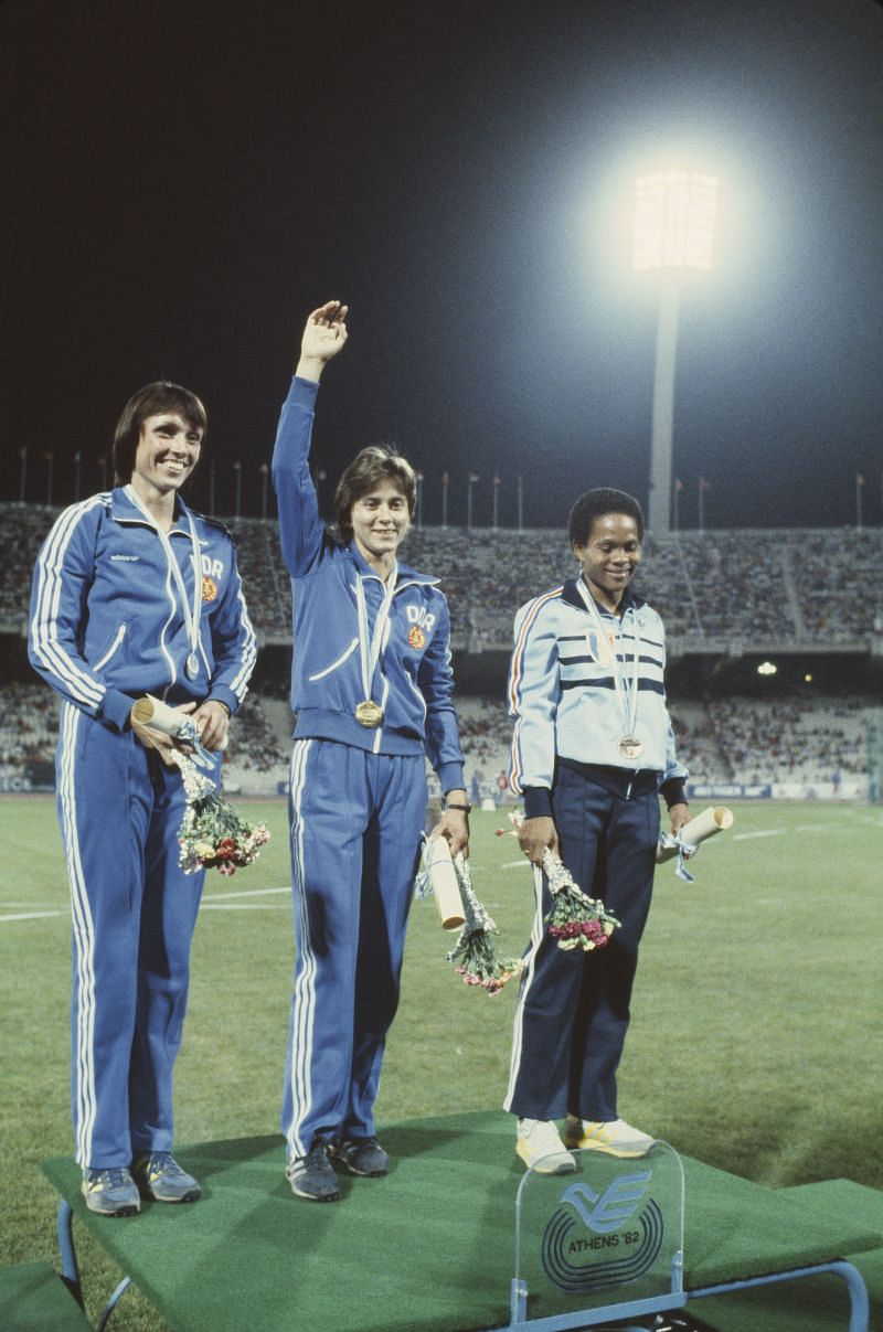 Marlies Gohr of East Germany (centre) with compatriot Barbel Wockel (L) and third placed Rose-Aimee Bacoul of France at the13th European Athletics Championships in September 1982