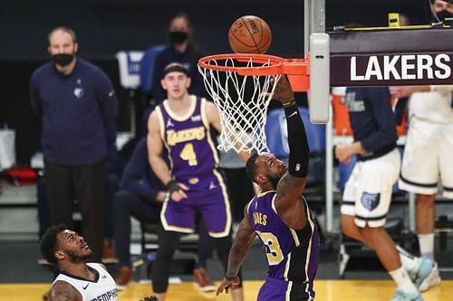 LeBron James completes a layup