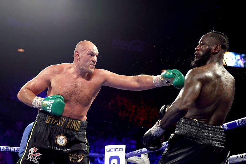 Tyson Fury (left) in action against Deontay Wilder (right)