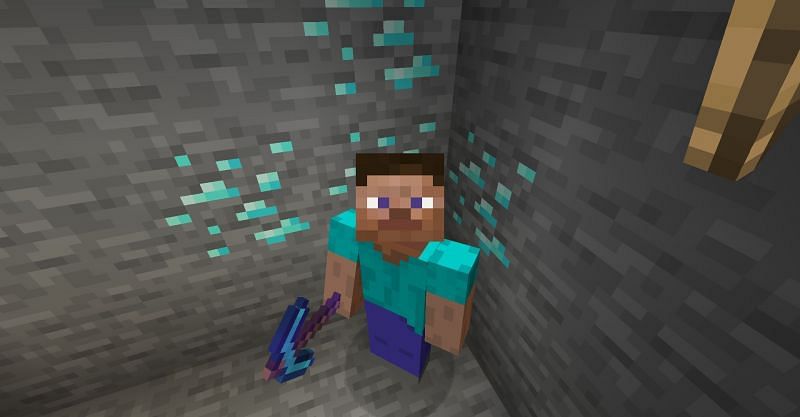 Steve near diamond ore in Minecraft. (Image via Minecraft)