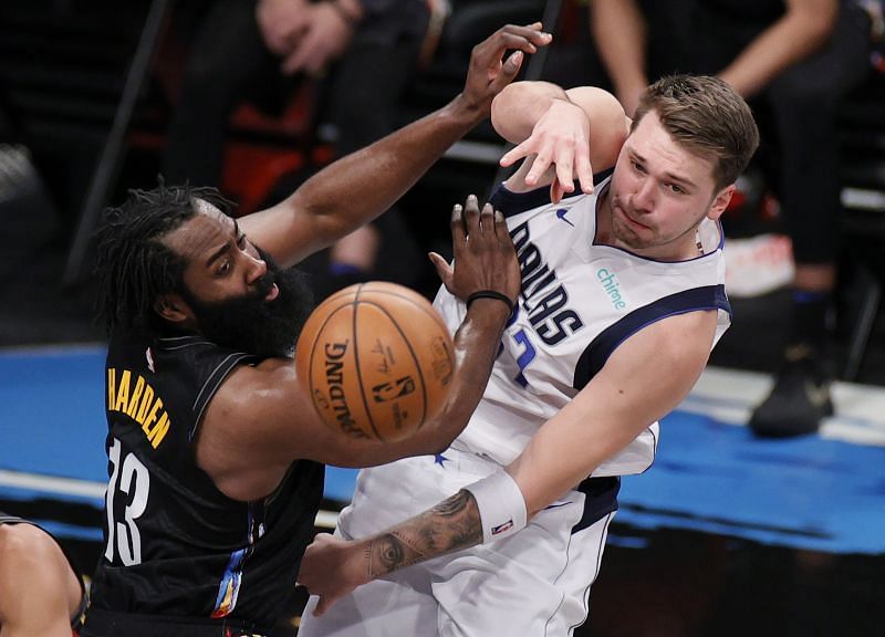 Luka Doncic #77 of the Dallas Mavericks passes the ball as James Harden #13 of the Brooklyn Nets defends during the second half at Barclays Center on February 27, 2021 in the Brooklyn borough of New York City. The Mavericks won 115-98. (Photo by Sarah Stier/Getty Images)