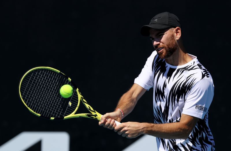 Adrian Mannarino plays a backhand