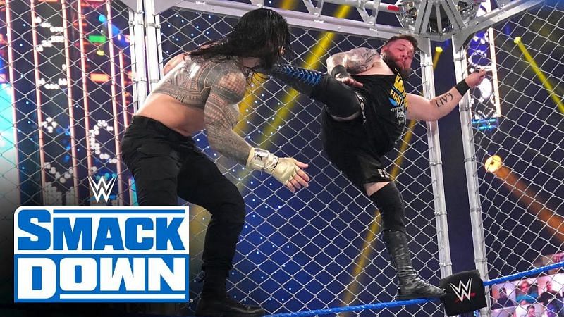 Kevin Owens and Roman Reigns battled it out inside a steel cage