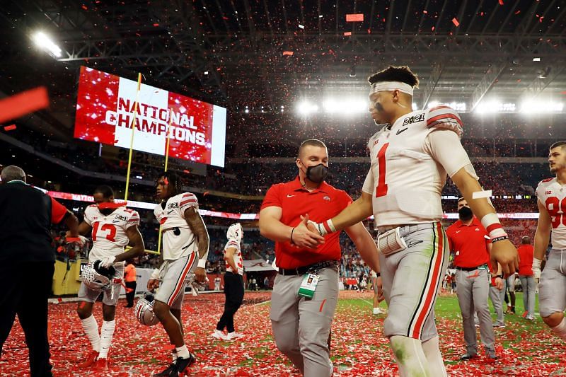 Ohio State QB Justin Fields walks off the field as a Buckeye for the last time