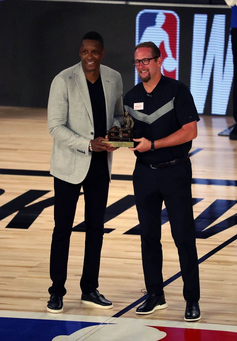 Toronto Raptors head coach Nick Nurse receives award from Masai Ujiri