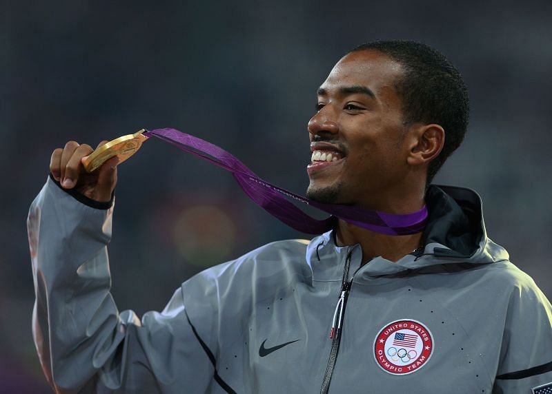 : Gold medalist Christian Taylor of the United States celebrates on the podium during the medal ceremony for the Men&#039;s Triple Jump at the London 2012 Olympic Games
