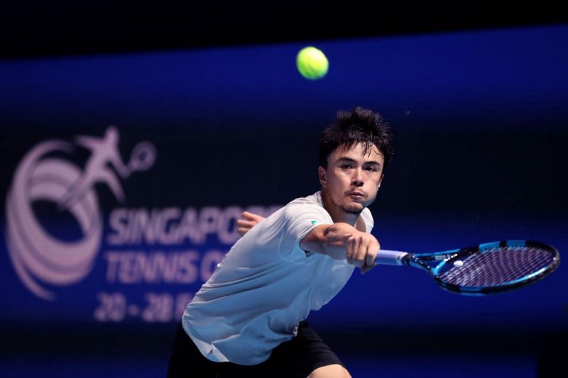 Taro Daniel in action on Day 1 of the Singapore Tennis Open