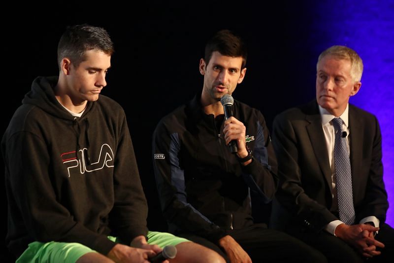 John Isner (L) and Novak Djokovic