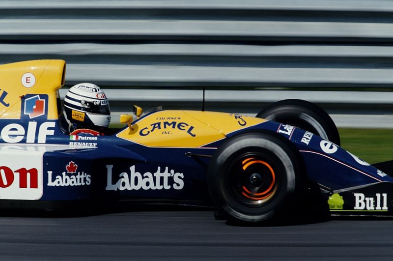 Riccardo Patrese lights up the disc brakes driving the Williams Renault Williams FW14B during the Canadian Grand Prix, 1992. Photo: Getty Images.