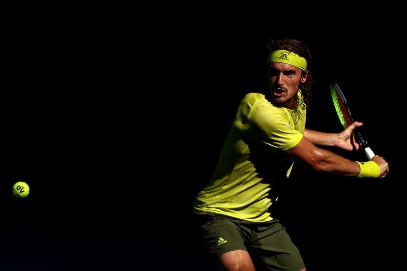 Stefanos Tsitsipas hits a backhand