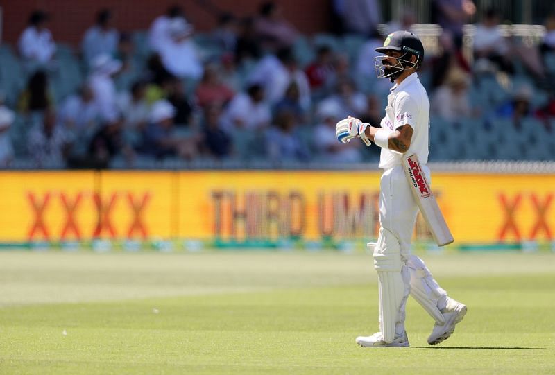 Virat Kohli walks off after being dismissed in Adelaide