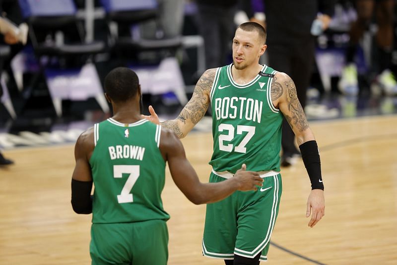 Jaylen Brown and Daniel Theis of the Boston Celtics