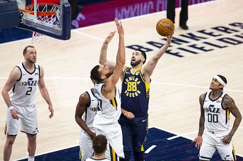 Utah Jazz Rudy Gobert attempting to block shot