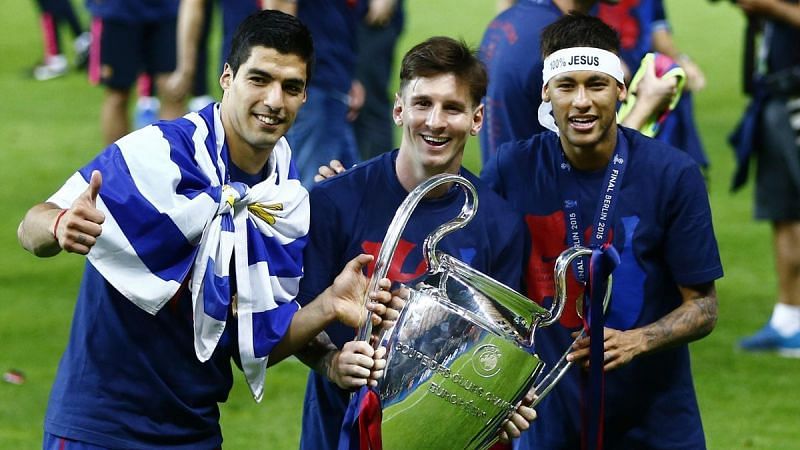 Lionel Messi, alongside Neymar (right) and Luis Suarez (right), guided Barcelona to a second continental treble in 2015.