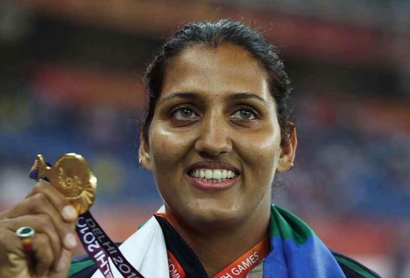 Krishna Poonia with her Commonwealth Games gold medal