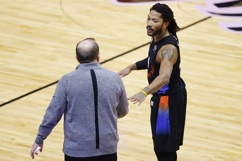 Head coach Tom Thibodeau of the New York Knicks talks with Derrick Rose #4 against the Miami Heat during the third quarter at American Airlines Arena on February 09, 2021 (Photo by Michael Reaves/Getty Images)