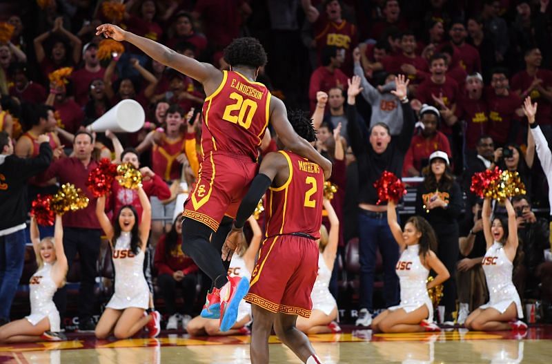 The USC Trojans celebrate a 3-point basket. 