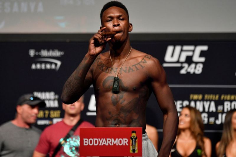 What weight does UFC Middleweight Champion Israel Adesanya walk around at?