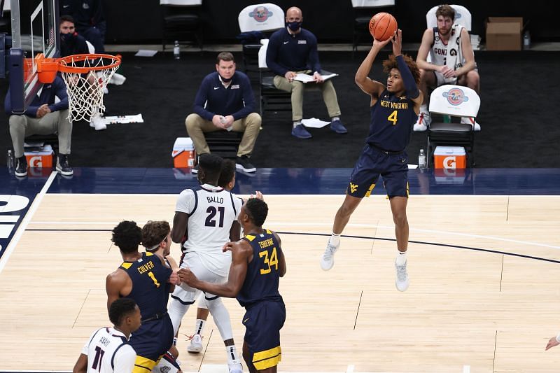 West Virginia Miles McBride shooting a mid range shot