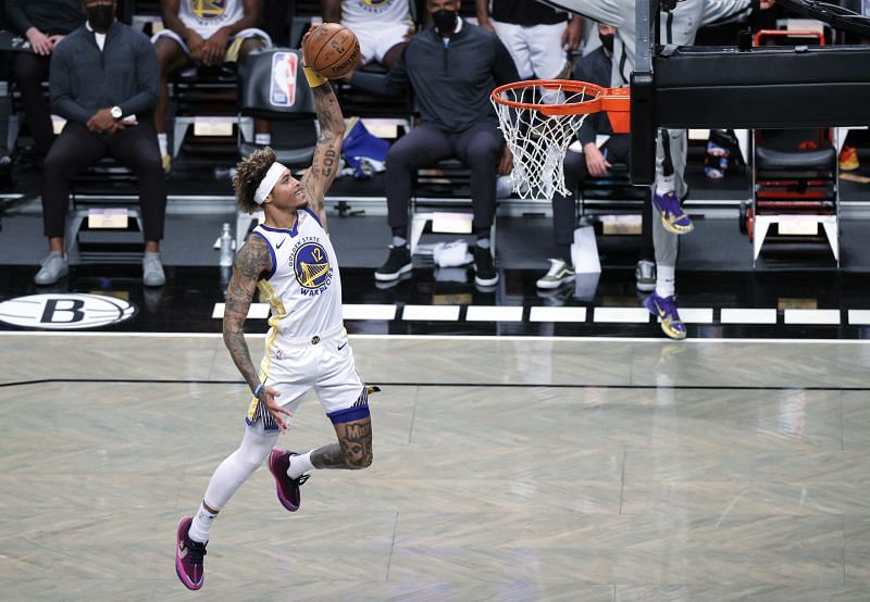 Kelly Oubre Jr #12 of the Golden State Warriors dunks