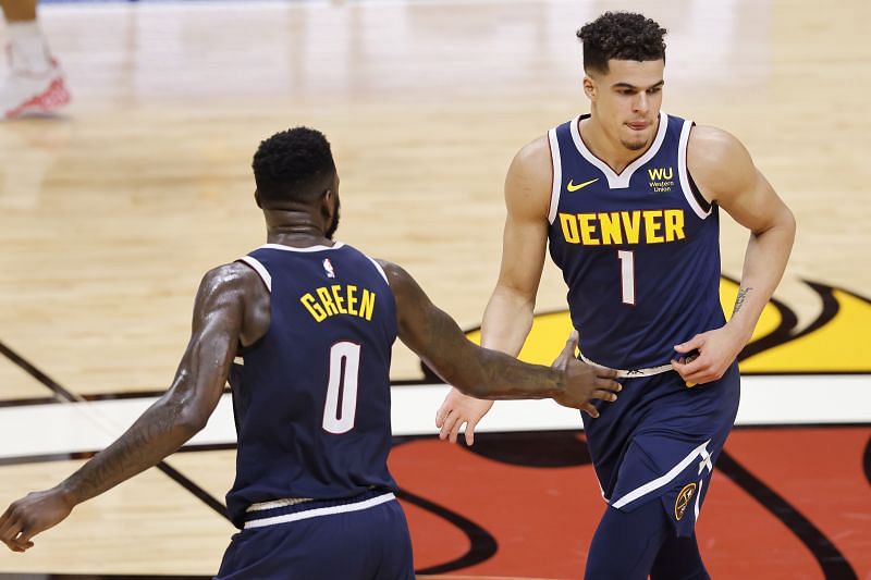 Michael Porter Jr. #1 and JaMychal Green #0 of the Denver Nuggets