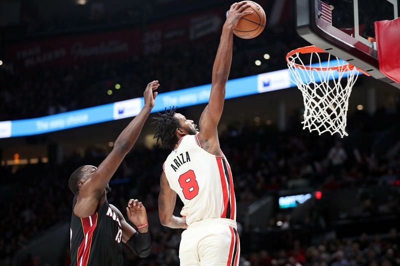 Trevor Ariza completes a dunk