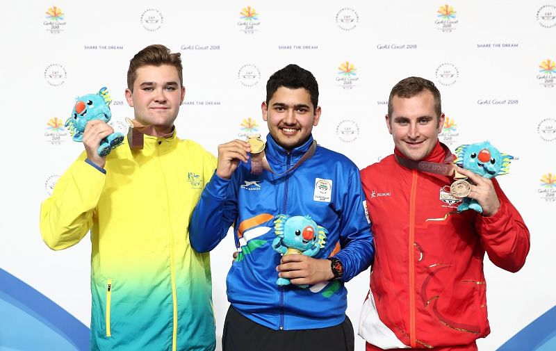 Anish Bhanwala poses with gold medal in the 25m Rapid pistol at 2018 Commonwealth Games