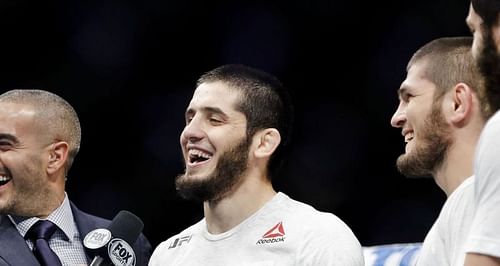 Islam Makhachev (Center) and Khabib Nurmagomedov (Right)